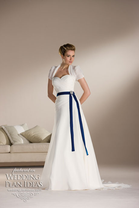 Modest wedding dresses with bolero and a blue ribbon