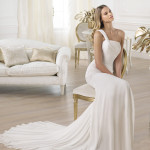 Elegant one shoulder wedding dress by Provonias