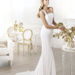 Elegant one shoulder wedding gown by Provonias