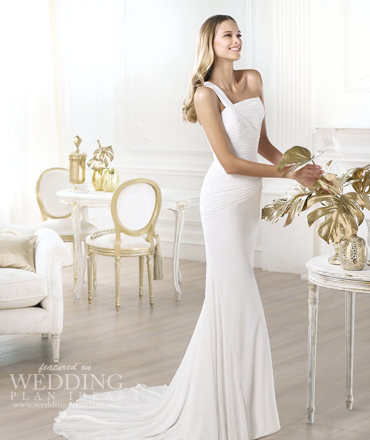 Elegant one shoulder wedding gown by Provonias